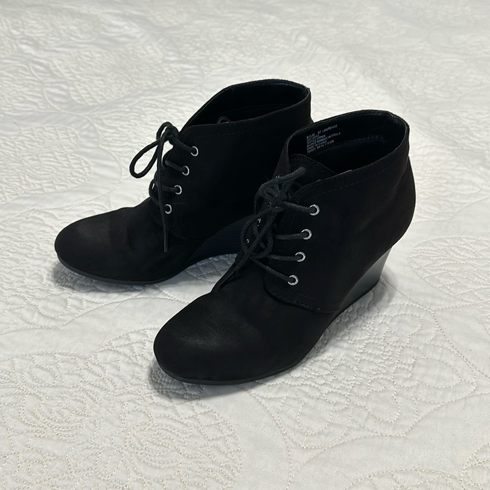 Black wedge heel boots